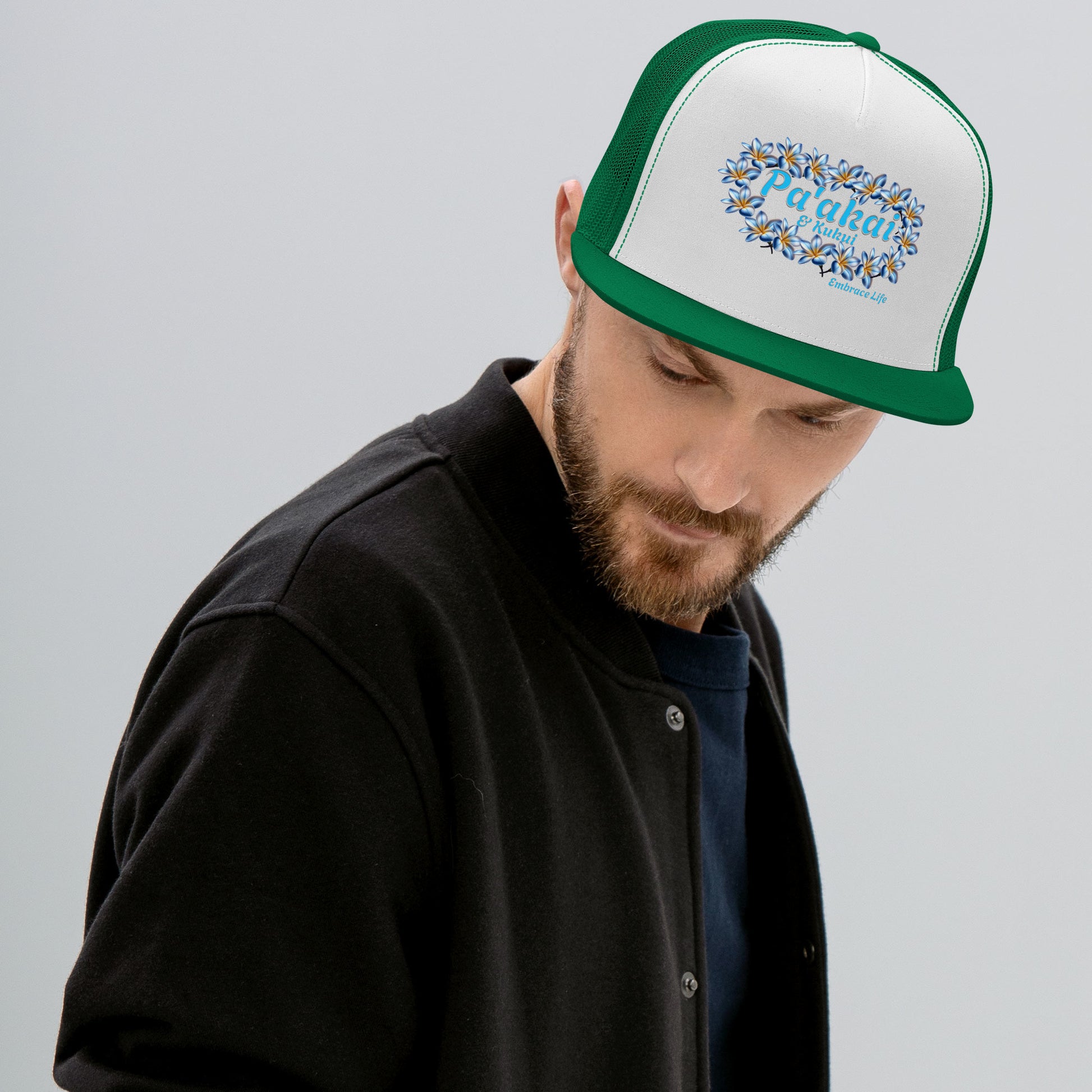 Pua mēlia Trucker Cap Trucker Hat Pa'akai & Kukui