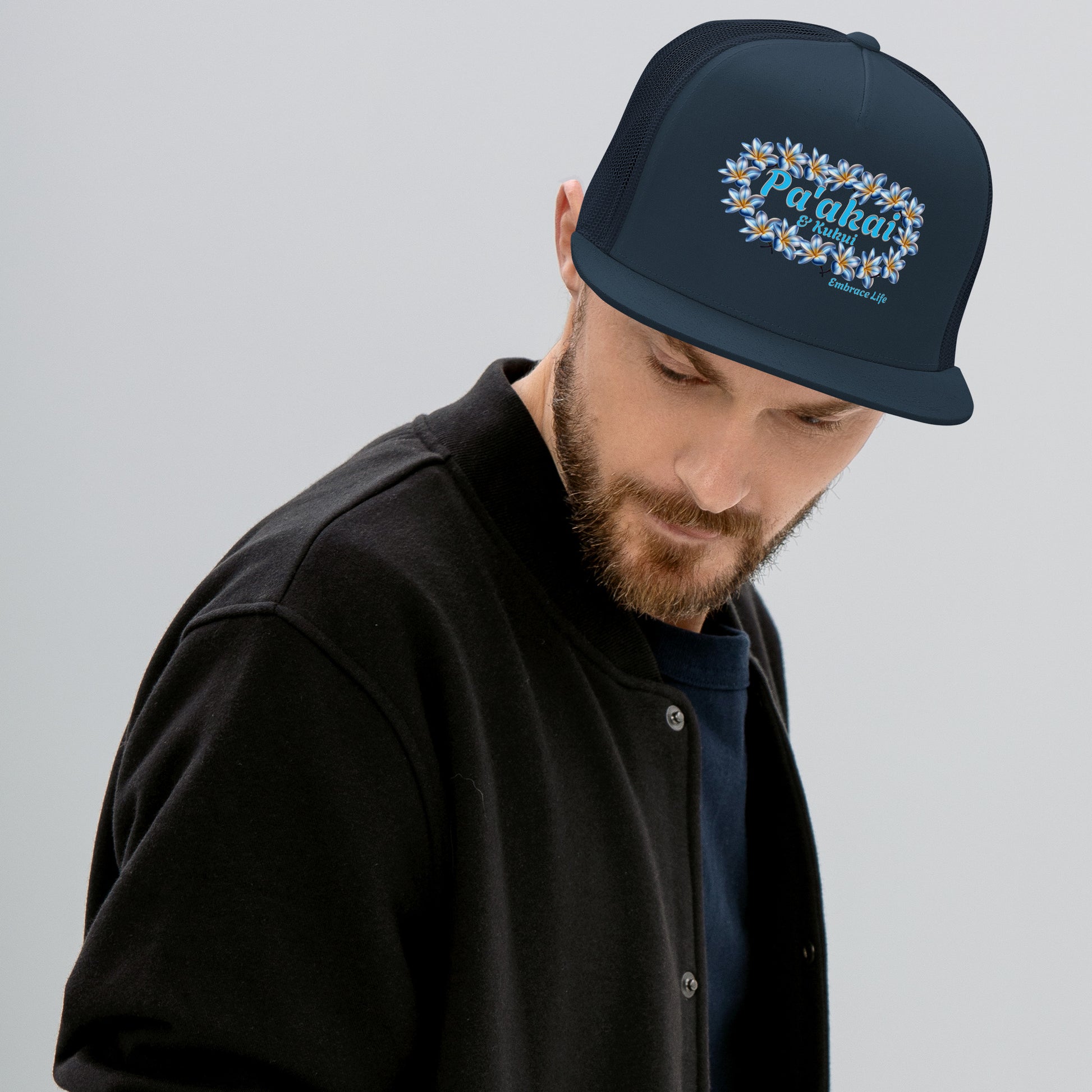 Pua mēlia Trucker Cap Trucker Hat Pa'akai & Kukui