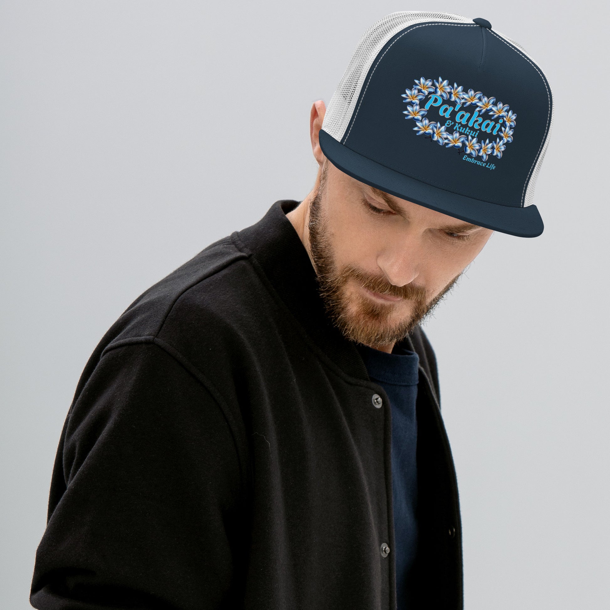 Pua mēlia Trucker Cap Trucker Hat Pa'akai & Kukui